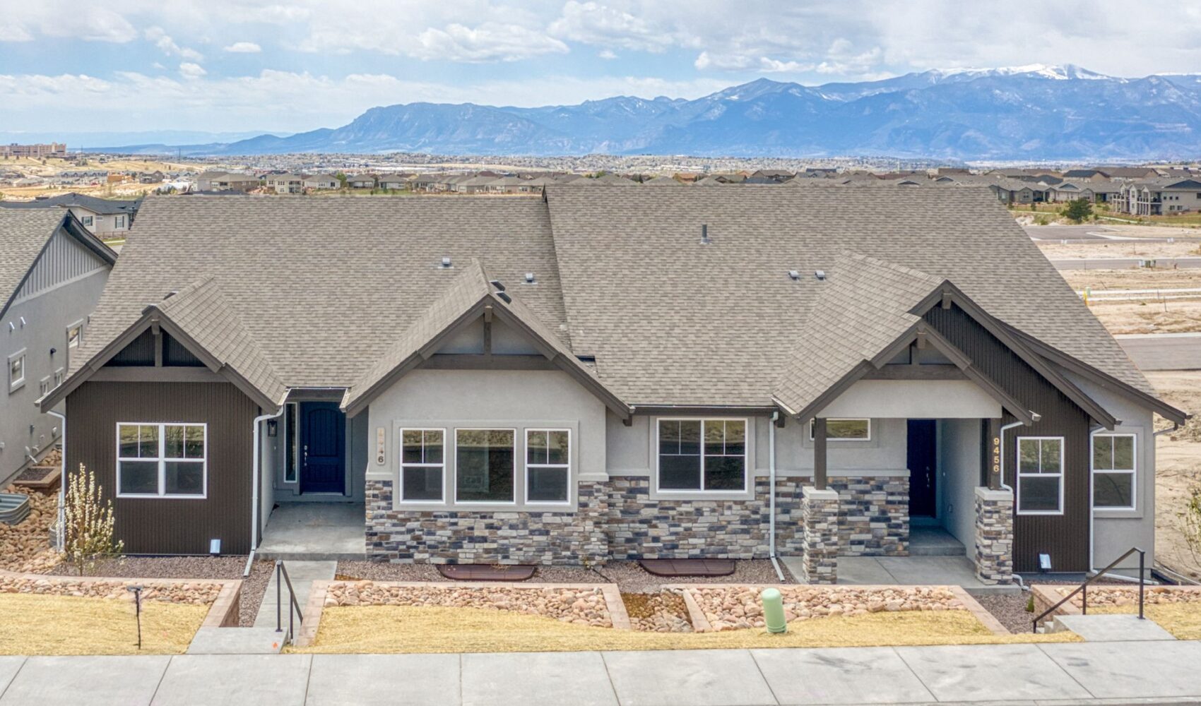 Stunning Vanguard Homes ranch on Wolf Valley Dr. offers 2,568 sq. ft. of modern luxury with 3 beds, 3 baths, and a 3-car garage.